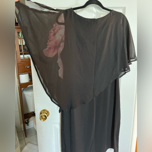 Asymmetric cocktail dress with sheer overlay. Peek-a-boo shoulder. - Picture 2 of 4
